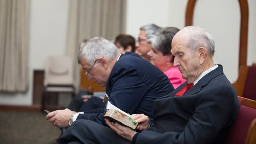 President Nelson reading scriptures