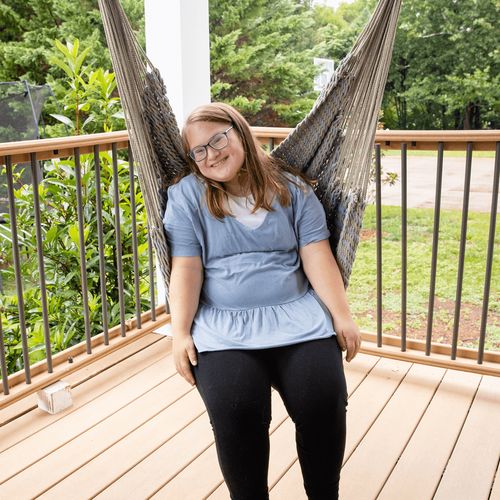 young woman in a swing