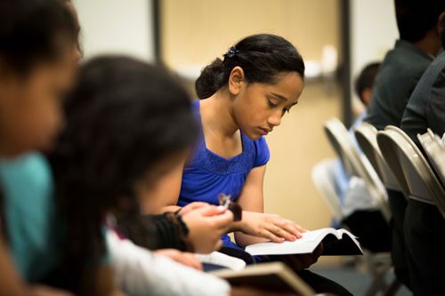 youth reading scriptures