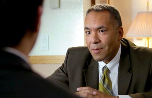 bishop interviewing young man