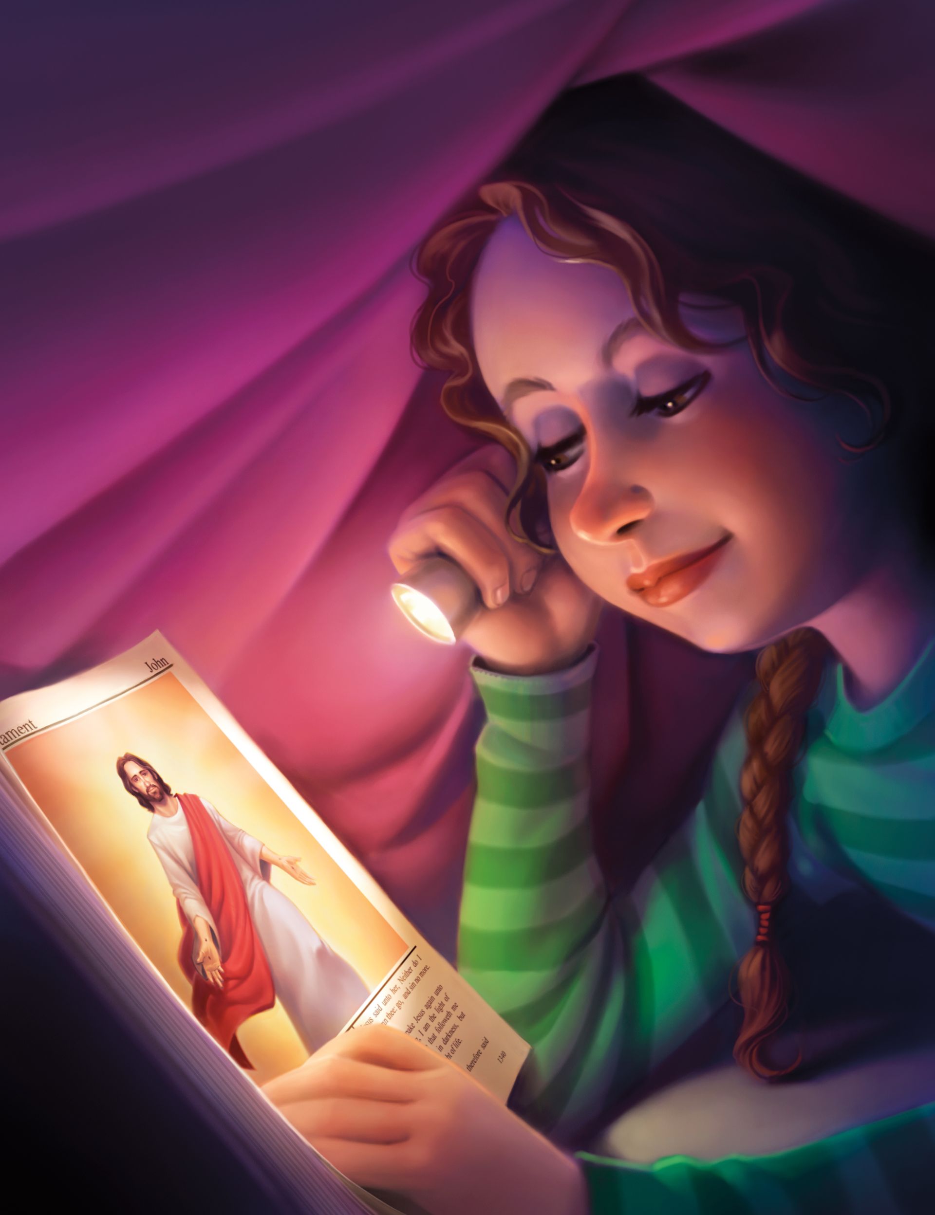 A girl lying under a blanket, holding a flashlight while reading a book with pictures of Christ.