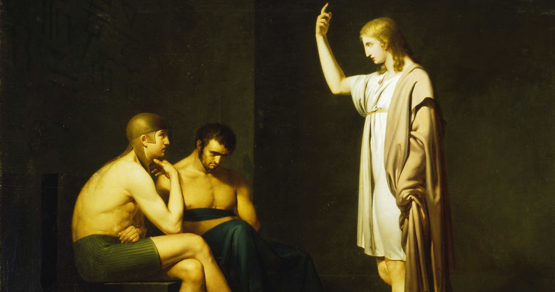 Joseph (son of Israel) in prison in Egypt.  He is standing before the chief butler and the chief baker, who are in prison with him.  Joseph is interpreting their dreams.