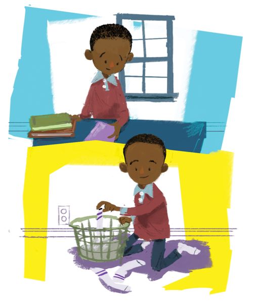 a boy picking up laundry