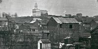 Image of Nauvoo and Nauvoo Temple from a daguerreotype, copy of photo,1846.  This image is a mirror image of PH 1300it135.tif.  From the Charles William Carter glass negative collection which contains portraits of prominent individuals and other Salt Lake City and Utah residents; photographs of activities, buildings, and homes in Salt Lake City; and photographs of Temple Square, Great Salt Lake and its resorts, Fort Douglas, several Utah communities, and railroads. Also includes portraits of Chinese and Indians and photographs of drawings, paintings, lithographs, cartoons, and photographs taken by photographers other than Carter.  Interior views of Salt Lake Temple, formerly numbered 901-904 in this collection, have been determined to be C.R. Savage Co. views and are now part of PH 600. Items 905-934 have not been renumbered.