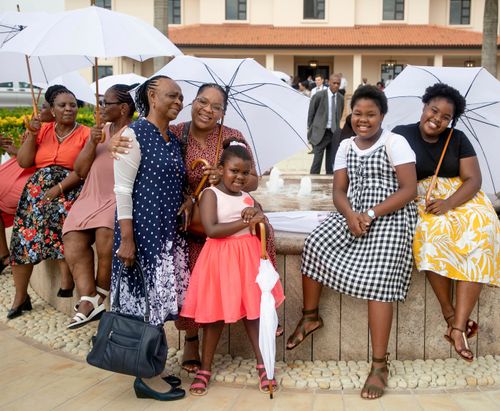 family outside temple