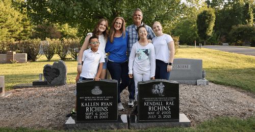 family at cemetery