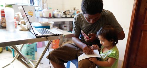 father and daughter working together