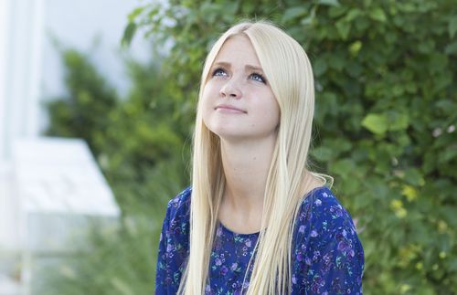 young woman looking up