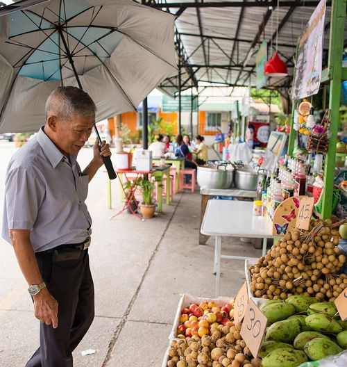 man shopping outside