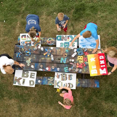 youth making signs