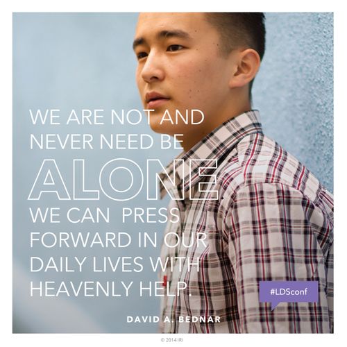An image of a young man paired with a quote by Elder David A. Bednar: “We are not … alone. We can press forward … with heavenly help.”