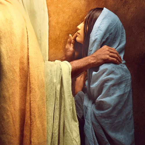 woman looking up at Jesus Christ