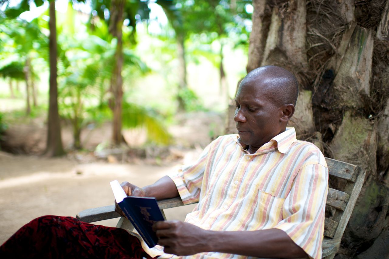 A woman reading the Book of Mormon