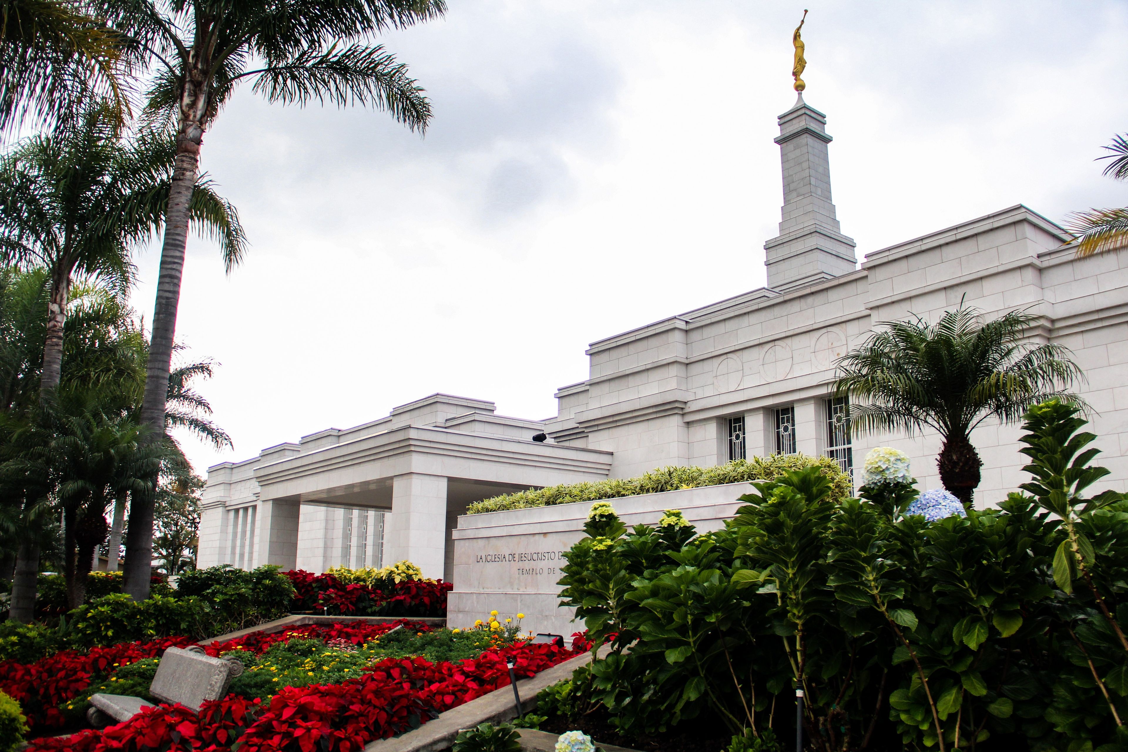 The San José Costa Rica Temple, including the name sign, entrance, and scenery.