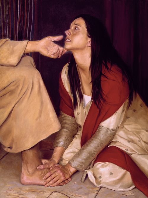 A painting by Jeff Hein of a woman in a white dress and red scarf kneeling at Christ’s feet.