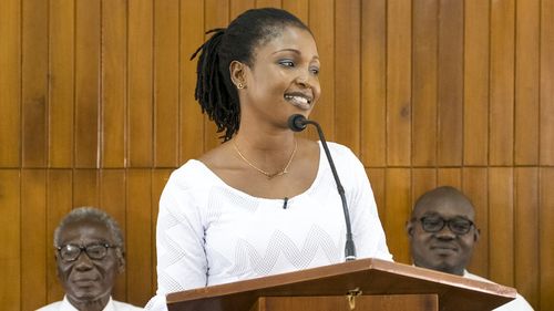 woman at pulpit