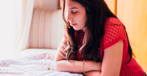 young woman praying