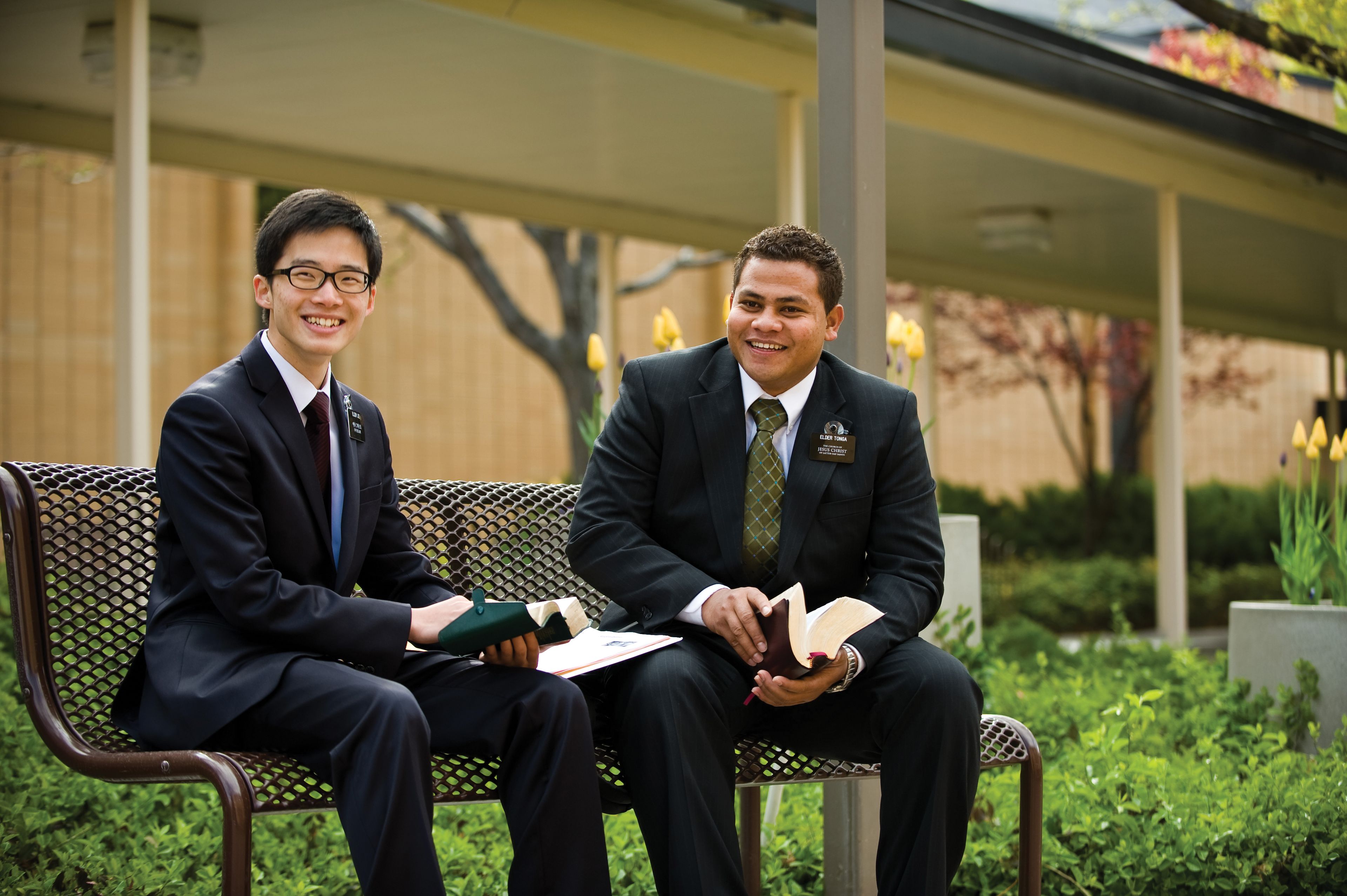 Two elder missionaries sitting on a bench at the Missionary Training Center.