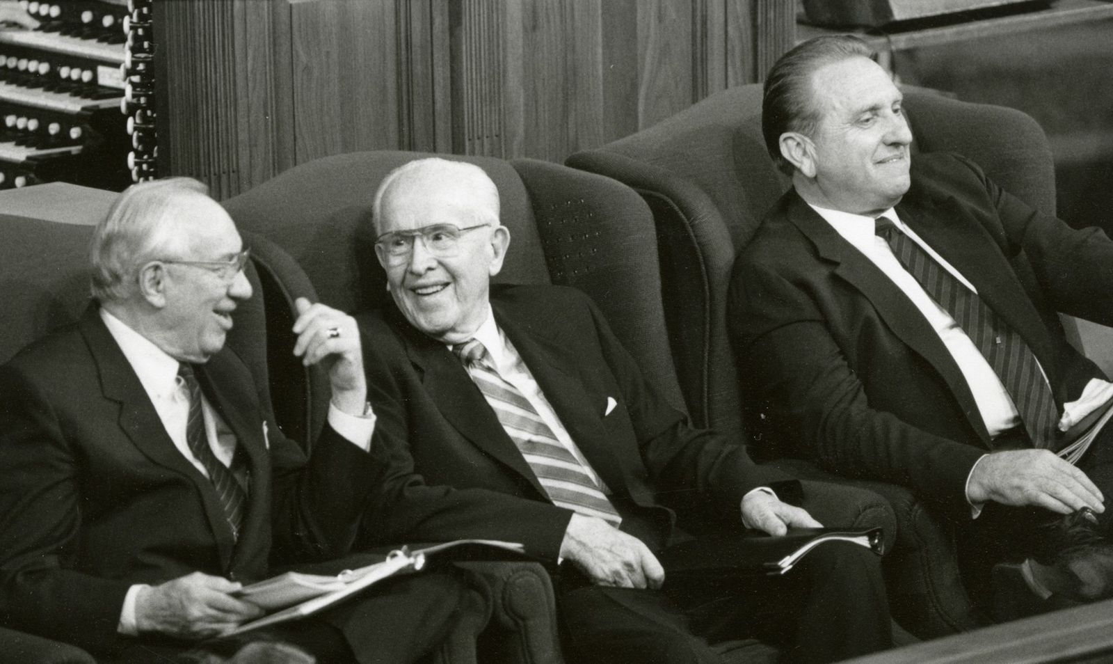 Ezra Taft Benson, Gordon B. Hinckley and Thomas S. Monson seated on the stand during General Conference.