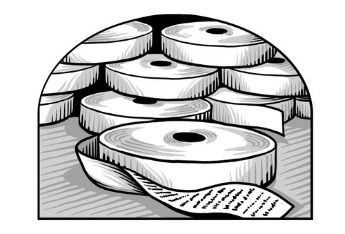 stack of rolls of paper with writing on them