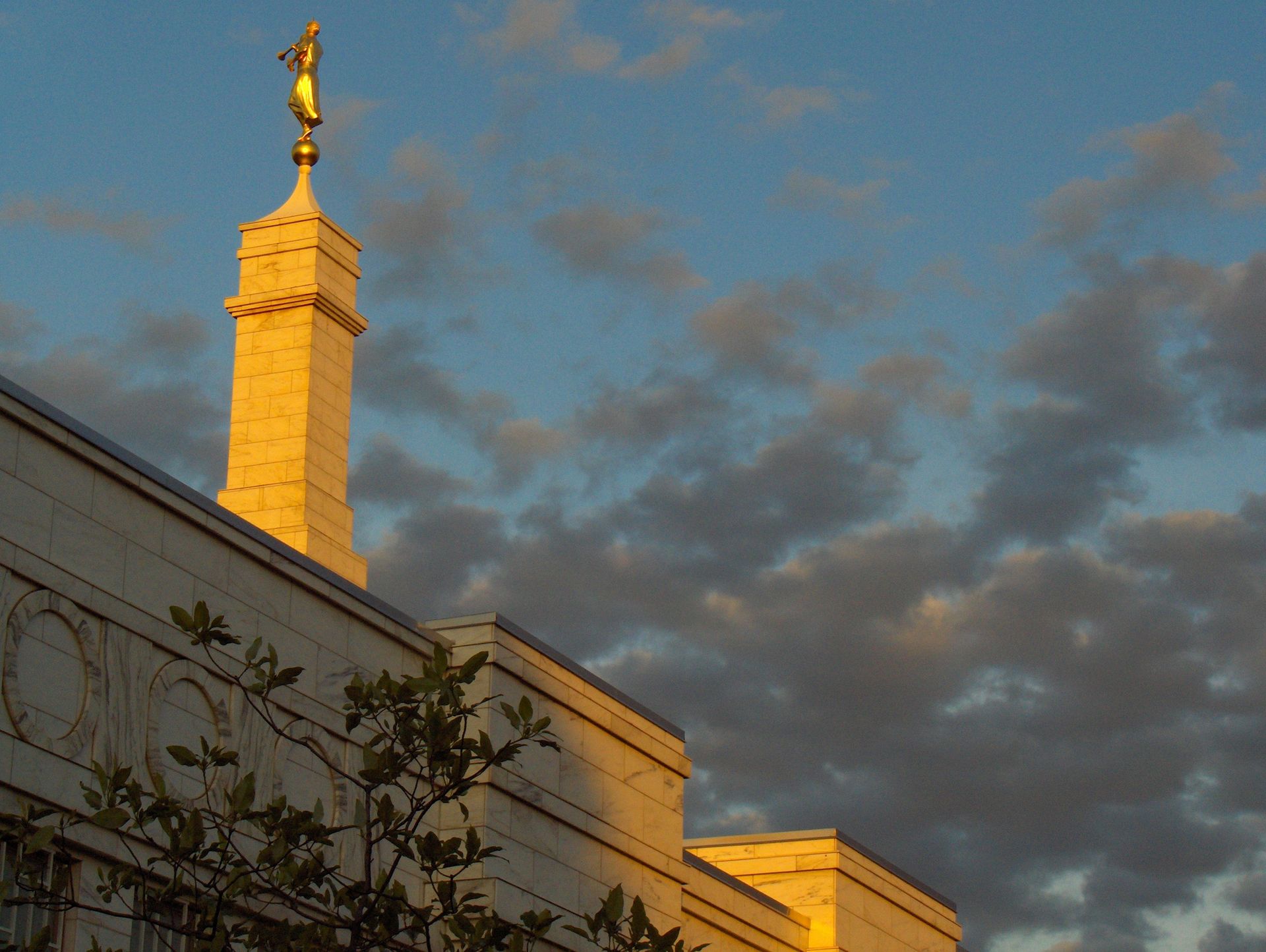 The angel Moroni on the Columbus Ohio Temple spire in the evening.