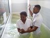Femeie fiind botezată