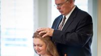 young woman receiving patriarchal blessing