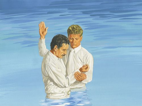 man getting baptized