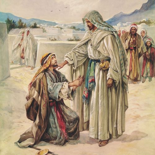 čovjek kleči pred Isusom