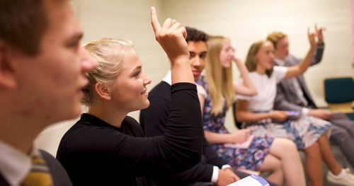 class members raising their hands