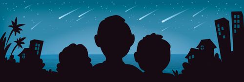 Silhouettes of a dad and two children watching a meteor shower