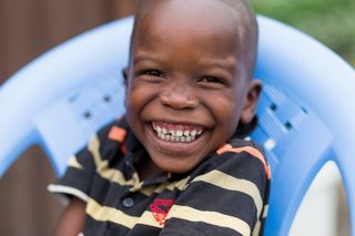 The faces of many children in DR Congo.