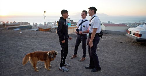 young man with missionaries