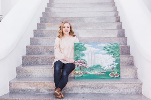 young woman with painting