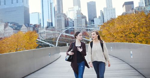 young women walking together