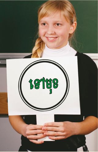 girl standing in front of chalkboard