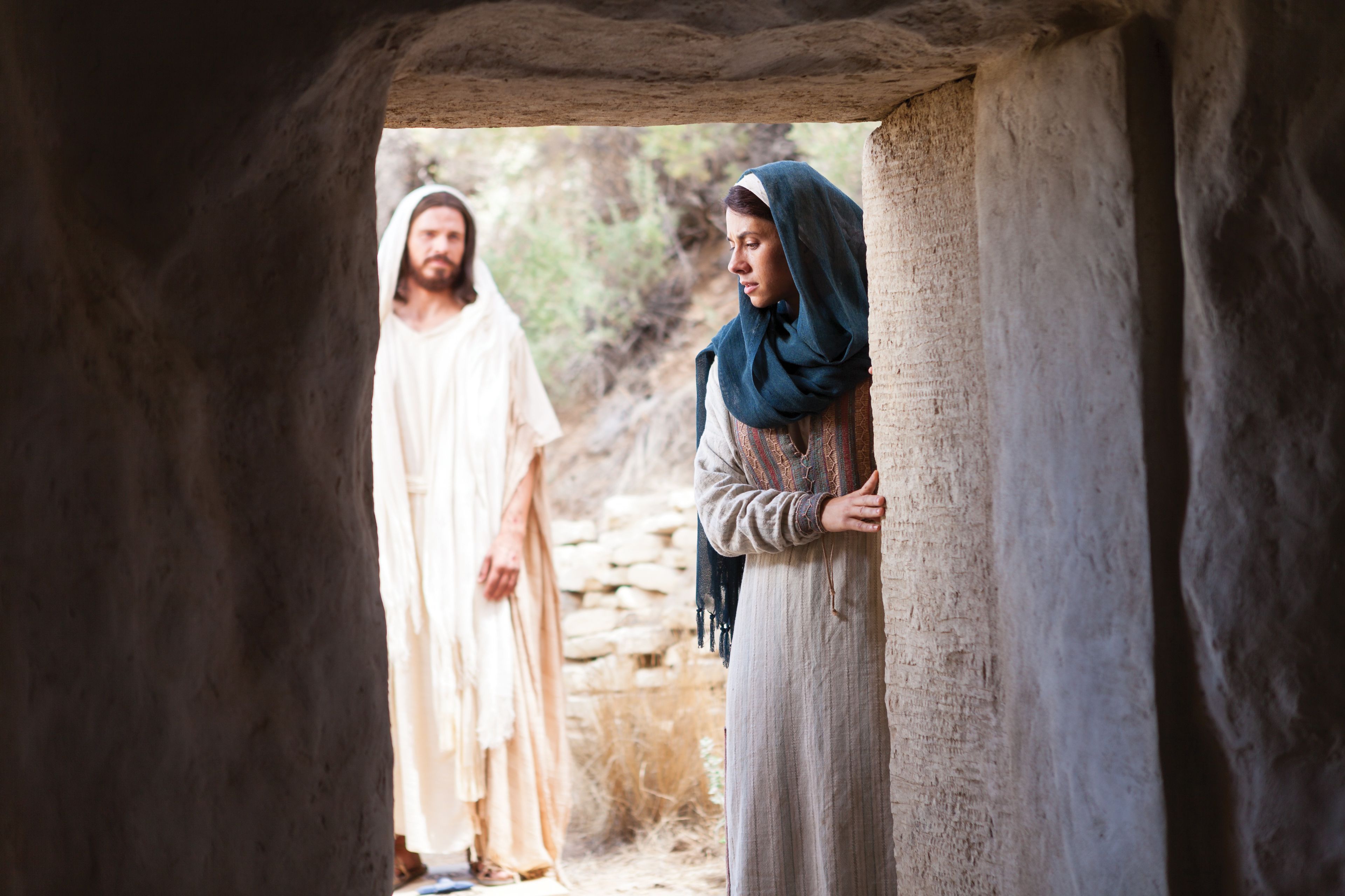 Mary weeps outside the tomb while Christ approaches to speak with her.