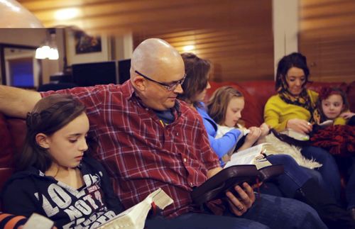 family reading scriptures