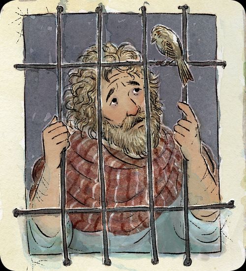 Paul looking at a bird from behind prison bars