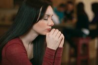 young woman praying