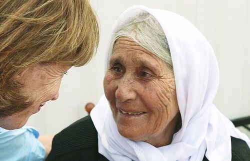 talking with elderly woman