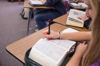 student studying scriptures