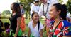 young people smiling outside