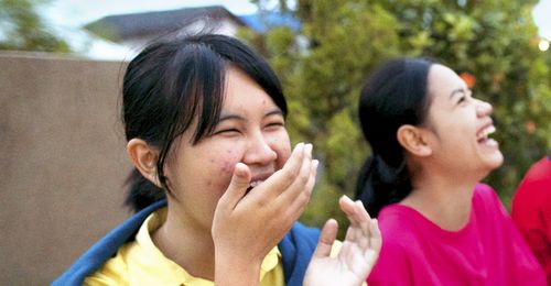 young women laughing