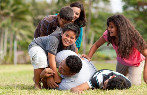 family playing outside