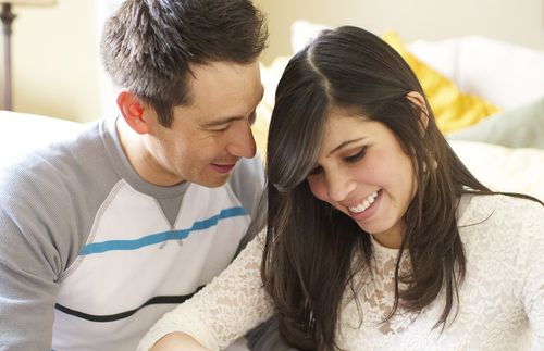 A young couple talking together.