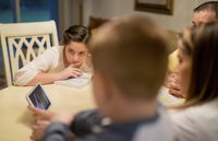 family viewing a video