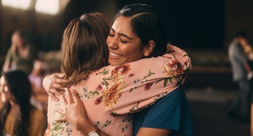 two women hugging