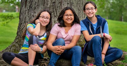 twin sisters and friend