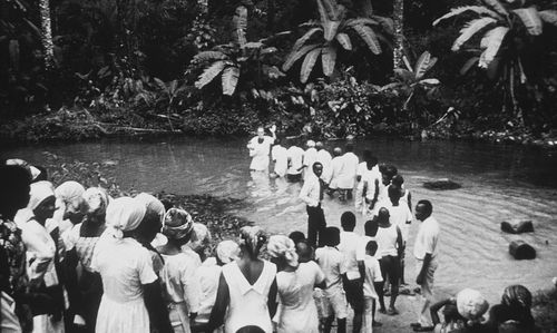 Nigerian converts being baptized